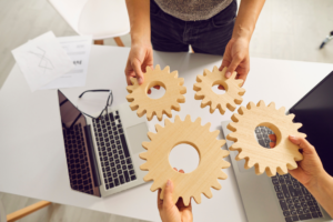 Employees holding features wheel