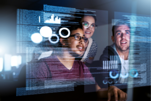 People looking at computer screen holograms