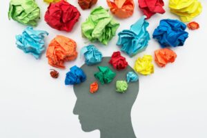 Colourful Paper Flowing From Head Shape